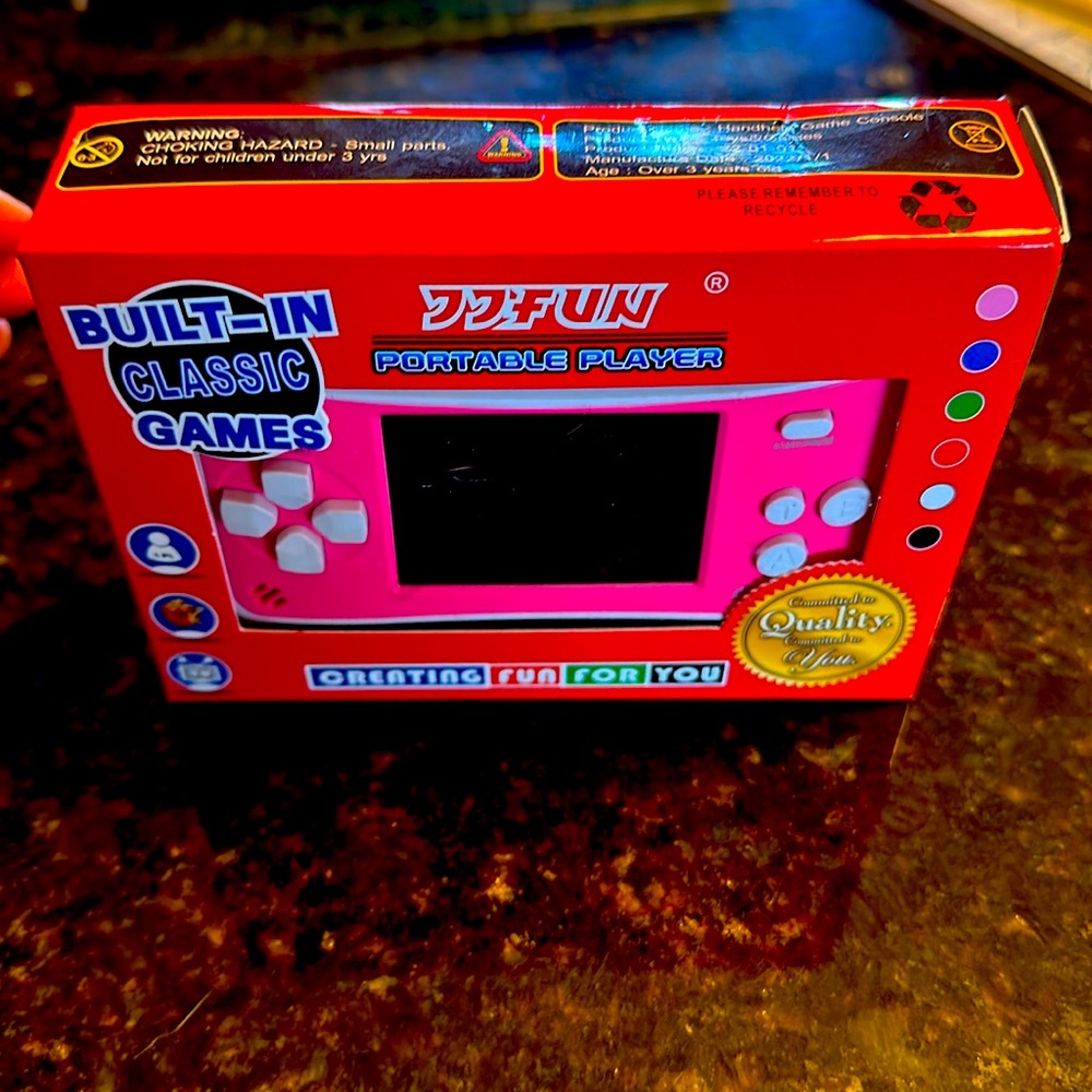 Hi Fun Classic Games device. Handheld gaming. Pink. Unopened